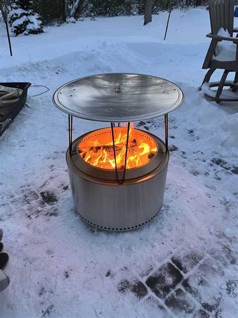 Burning with my homemade heat deflector. r/SoloStove