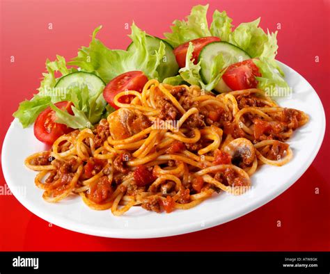 spaghetti bolognese and salad
