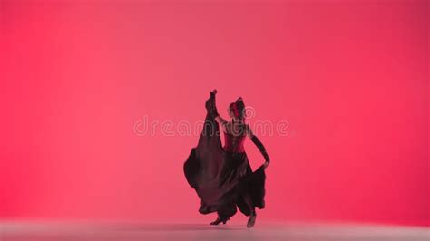 Image of a group of dancers performing Spanish Rose