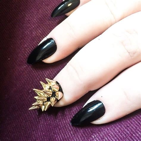 Stand Out with Edgy Spike Nail Designs