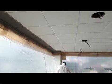 spraying ceiling tiles