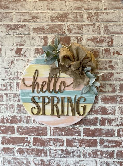 Hello Floral door hanger that is Perfect for Spring & Summer to bring