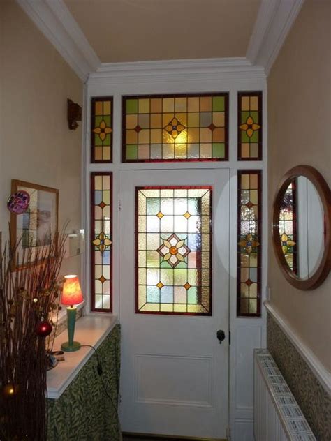 home.furnitureanddecorny.com:stained glass panel above front door