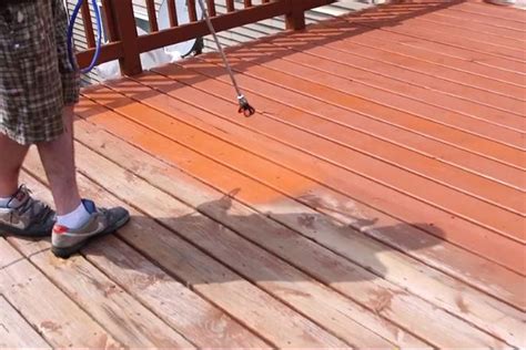 staining a deck with sprayer