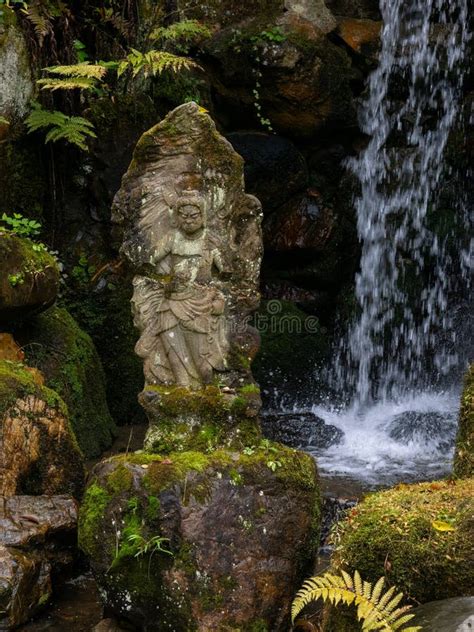 Statue In A Waterfall