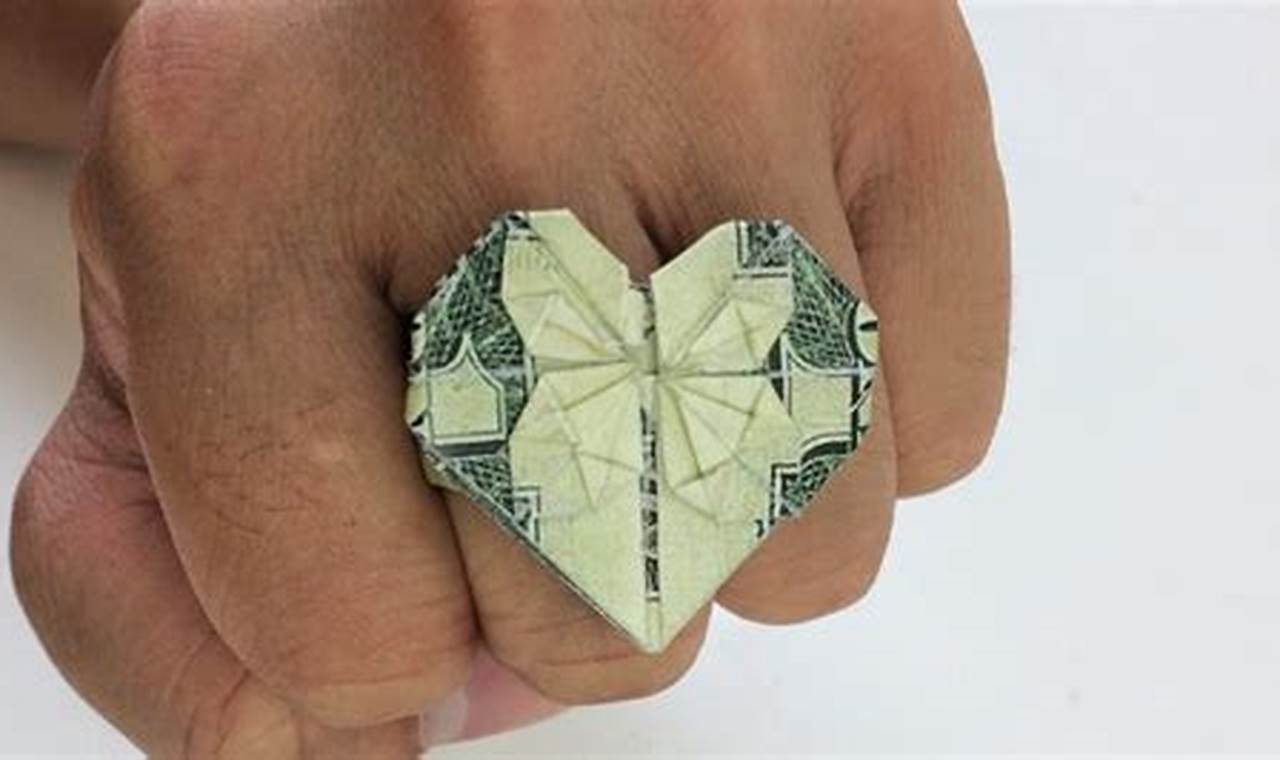 step by step dollar bill origami heart ring