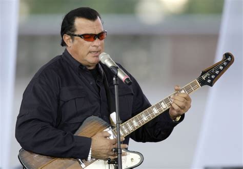 steven seagal playing guitar and singing