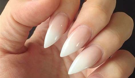 White tip stiletto nails with a little dash if sparkle!! ️