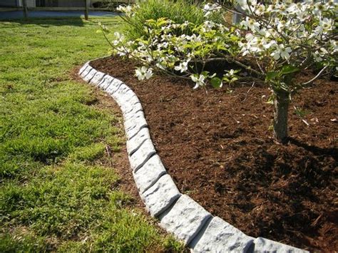 Garden edging idea using stacked stone. Works perfectly for that gentle