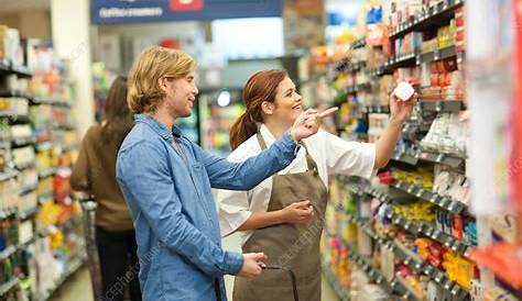 Store Assistant Portrait Of Sales Or Cashdesk Worker In Supermarket