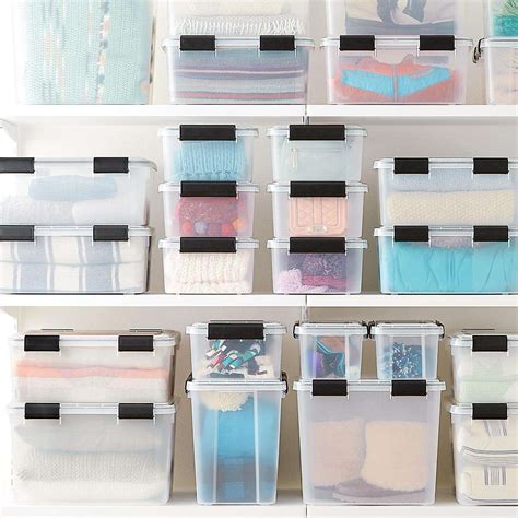 storing clothes in plastic containers
