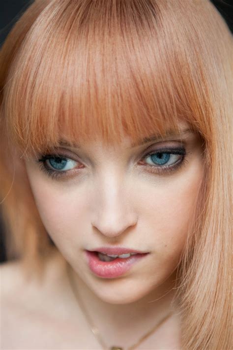 strawberry blonde hair and blue eyes