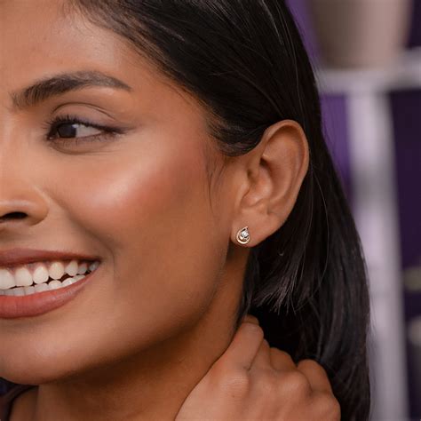 Stud Earrings Caratlane