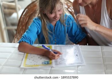 students doing a crossword puzzle in a classroom