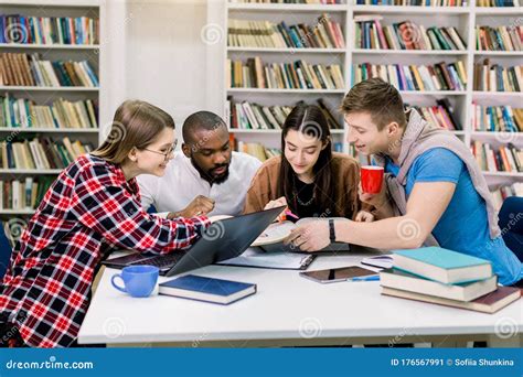 Students studying in library