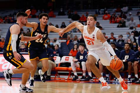 SU men's basketball wins against Louisville (photos)