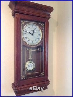 sunbeam wall clock with chime and glass shelkves