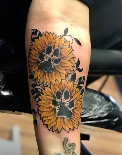 Sunflower Paw Print Tattoo Pawprint tattoo, Tattoos, Dog print tattoo