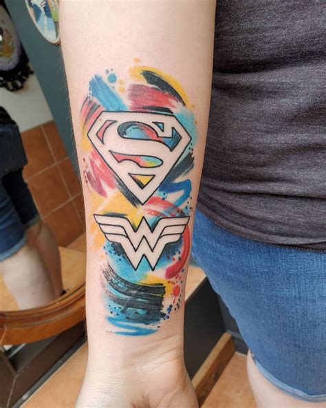 Famous Superwoman Tattoo Designs Ideas