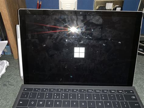 Surface Pro 7 stuck in bootup screen and Windows logo seems to be