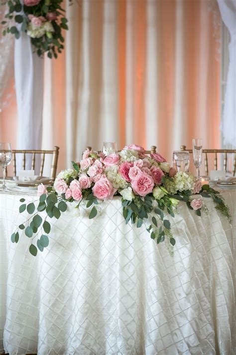 Cascading Ivy and Rose Sweetheart Table Centerpiece