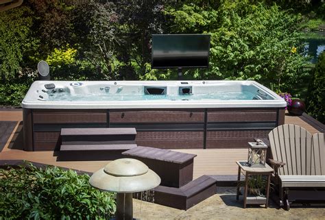 Hydropool Self Cleaning swim spa installed in a deck Pool hot tub