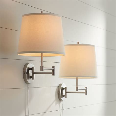 swing arm wall light with white shade