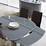 Buy Olivia White Glass Grand Swivel Dining Table with Brushed Stainless