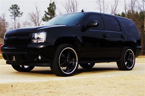 Black Tahoe Rolling on 24 Inch Rims by Exclusive Motoring — Gallery