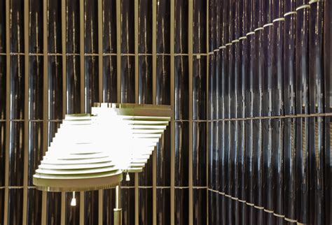 Tall lamp accentuating architectural features