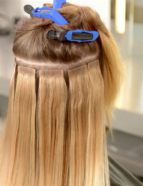 Seamless tape in hair extensions in virgin remy human hair chestnut