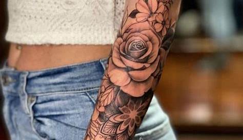 Flowers and blackout sleeve tattoo | Sleeve tattoos, Solid black tattoo