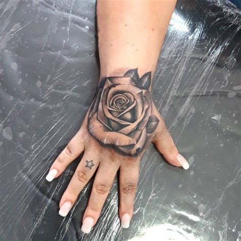 List Of Tattoo Design Flower Hand Ideas
