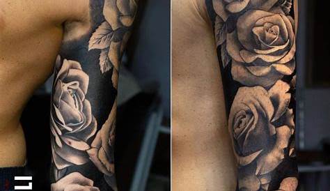 Flowers and blackout sleeve tattoo | Sleeve tattoos, Solid black tattoo
