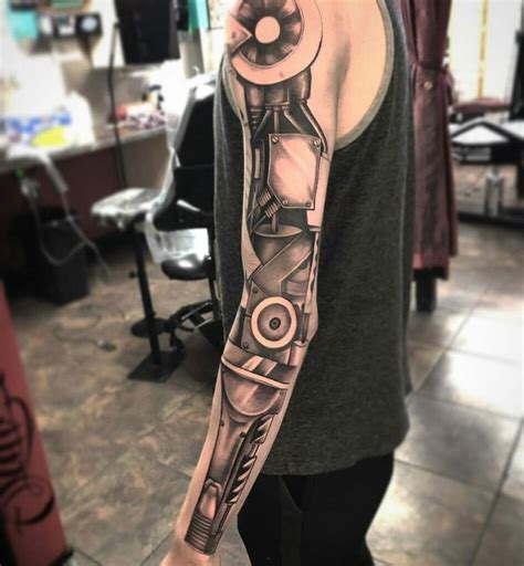 36 Mechanical Arm Tattoos With Meanings TattoosWin