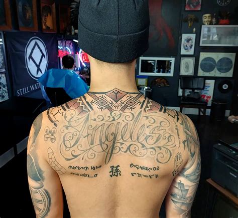 Tattoos On Trapezius