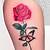 tatuajes de rosas con mariposas