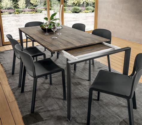 tavolo allungabile moderno con sedie