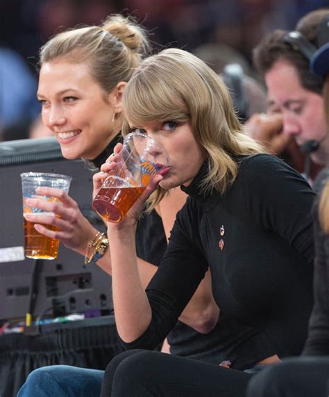 taylor swift drinks a beer