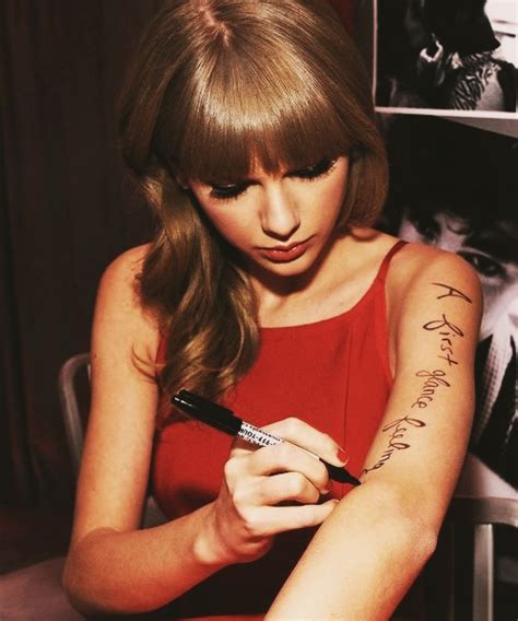 taylor swift writing hand