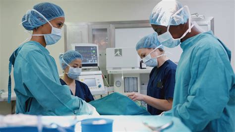 Surgical Team Operating Photograph by Arno Massee Fine Art America