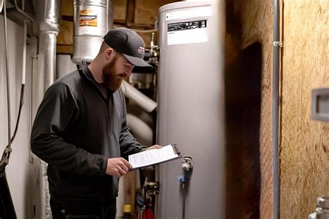 Technician inspecting a heater
