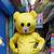 teddy bear mascot costume yellow suit meme covid standardized