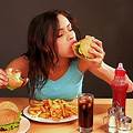 Teenager Eating Junk Food