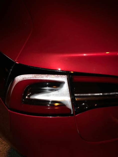 tesla model 3 moisture in rear lights