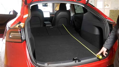 tesla model y open trunk from inside