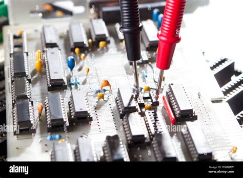 testing circuit board with multimeter