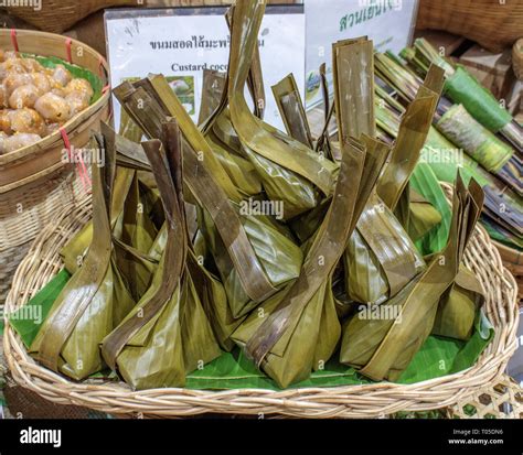 thai food wrapped in banana leaf