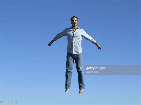 that man is floating in the air