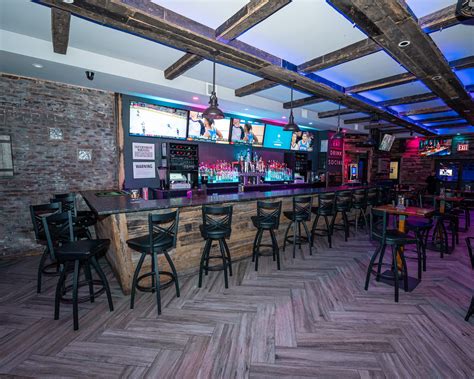 Unveil the District Bar's Secrets: A Must-Try Nightspot